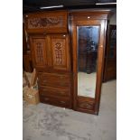 A Victorian mahogany part wardrobe , being centre linen press section and mirror door robe,