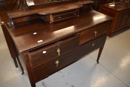 An Edwardian mahogany dressing table having satinwood line inlay decoration