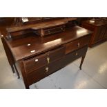 An Edwardian mahogany dressing table having satinwood line inlay decoration