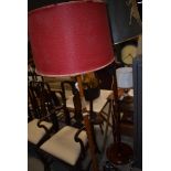 Two turned wood columned standard lamps