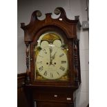 A 19th Century, George III, oak and mahogany long case clock with fluted case decorated with