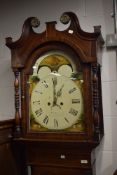 A 19th Century, George III, oak and mahogany long case clock with fluted case decorated with