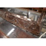 A small planished copper fire fender, internal width approx tapered 68-73cm