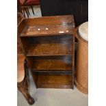 An early 20th Century oak low bookshelf