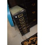 A set of vintage wooden filing or parts drawers having brass label holders