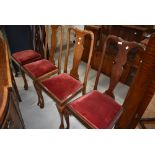 A harlequin set (two plus two) early 20th Century Queen Anne style mahogany vase back dining chairs