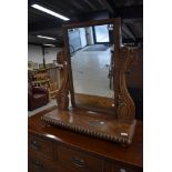 A 19th Century mahogany toilet mirror of large proportions having scroll frame, width approx. 68cm