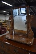 A 19th Century mahogany toilet mirror of large proportions having scroll frame, width approx. 68cm