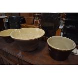 A set of three salt glazed dough bowls, various sizes