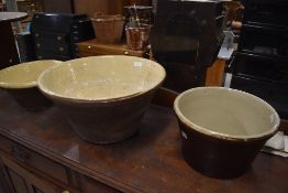 A set of three salt glazed dough bowls, various sizes