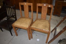 A pair of Art Deco period dining chairs