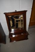 A 19th Century mahogany framed hall mirror having compartmental section with lift flap, approx width