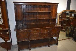 A late 19th or early 20th Century Jacobean style oak dresser, width approx. 183cm