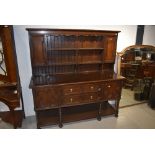 A late 19th or early 20th Century Jacobean style oak dresser, width approx. 183cm