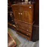 A mid 20th Century walnut tallboy