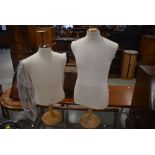 Two tailors or shop display torso dummies