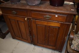 A Victorian mahogany sideboard, condition bit rough, been used in outbuilding possibly, width