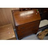 An early 20th century inlaid mahogany bureau