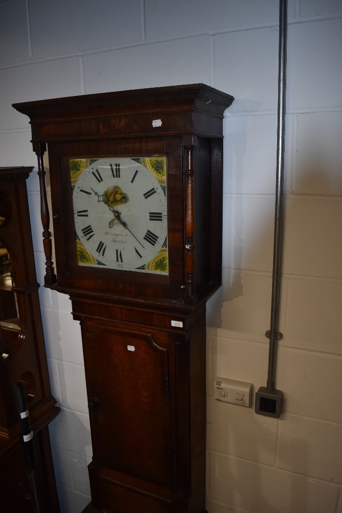 A traditional oak and mahogany longcase clock, having painted dial named for Phillipson,