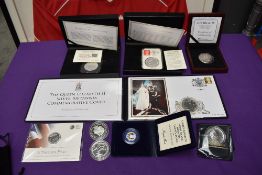 A collection of Silver GB Coins including 2013 £20, 2013 1oz Britannia £2, 2010 Olympic Churchill £