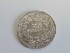 A Queen Victoria 1865 Silver Shilling, die number 92