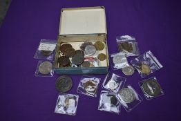 A collection of Coins, Medals and Medallions including 1848 Half Penny, double headed US Morgan