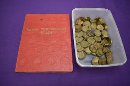 A collection of GB brass Threepences, in folder and loose in box including 1946 & 1949 coins