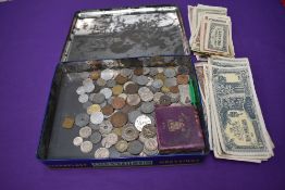 A collection of World Coins and Banknotes including WW2 Japanese Government notes, WW2 Italy