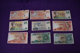 A collection of World Banknotes, Singapore 10 Dollars x2, 5 Dollars x2 and 1 Dollar, Bank Negara Ma