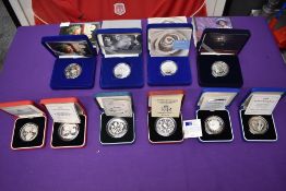 A collection of ten GB Silver Proof Crowns and £5 Coins with certificates and in cases, 1990 90th