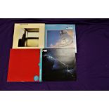 A lot of four original Dire Straits vinyl albums