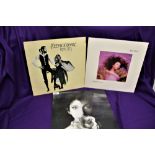 A three album lot including Fleetwood Mac and Kate Bush