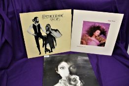 A three album lot including Fleetwood Mac and Kate Bush