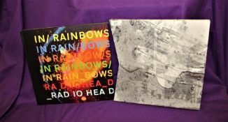 A box set of ' in rainbows ' by Radiohead - cd's and both vinyl records and in ex condition -