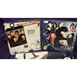 A lot of five albums by INXS