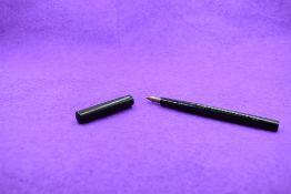 A Mabie Todd & Co Blackbird Eyedropper pen, in chased BHR a MT & Co No2 nib. Approx 13.7cm