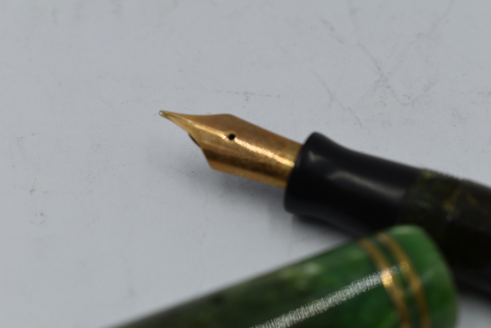 A Parker Duofold button fill fountain pen in green marble, two narrow bands to cap and Parker - Image 2 of 2