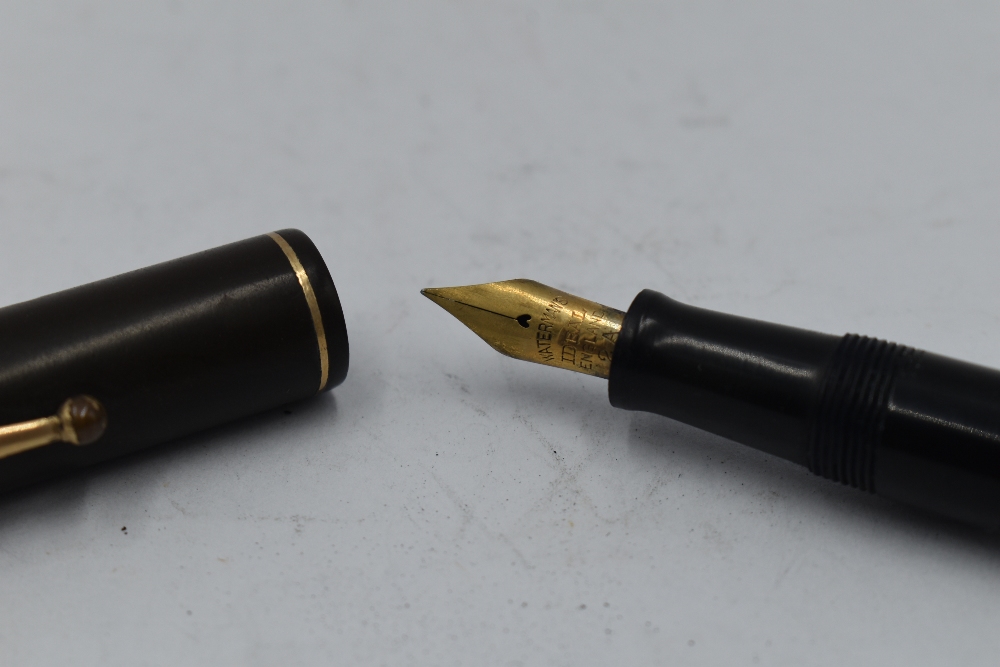 A Watermans Ideal leverfill fountain pen in black with single narrow band to cap and a Watermans - Image 2 of 2