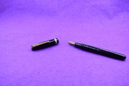 A Watermans W3 leverfill fountain pen in Black single decorated broad band with Watermans W3 nib.