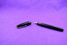 A Watermans leverfill fountain pen in Black two narrow bands with Watermans 5 nib. Approx 13.7cm