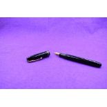 A Watermans leverfill fountain pen in Black two narrow bands with Watermans 5 nib. Approx 13.7cm