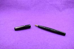 A Mabie Todd & Co Self filler leverfill fountain pen in black with smooth finish with Swan No1