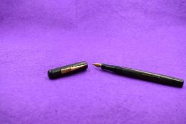 A Mabie Todd & co Swan Self Filler leverfill fountain pen in BHR (discoloured), screw cap, with Swan