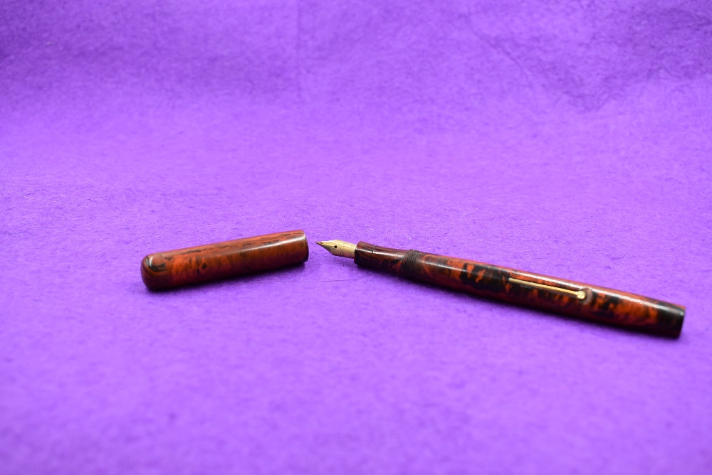 A Mabie Todd & Co Swan SF2 Self filler leverfill fountain pen in red marble, clipless, with Swan No2