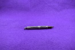 A retracting pencil hallmarked silver, by Samson & Morden Co Ltd.