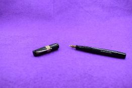 A Mabie Todd & Co Blackbird 5261 Self filler Leverfill fountain pen, in chased BHR, a Blackbird nib.