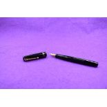 A Mabie Todd & Co Swan 6260 Self filler leverfill fountain pen in black with two narrow gold band to