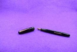 A Mabie Todd & Co Swan 3160 Self filler leverfill in black, single band to cap, with Swan No1 nib.