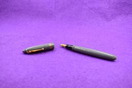 A Mabie Todd & Co Swan 4230 Leverless fountain pen with button fill having two narrow and one