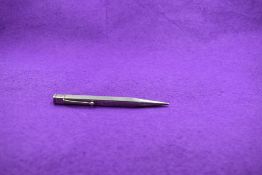 A Hallmarked Sterling Silver Yard o Led mechanical pencil. Square body with engine turned
